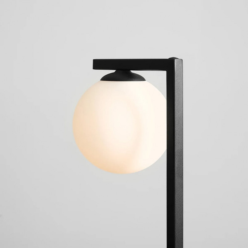 Lampa stołowa szklana kula Zac Black biało-czarna marki Aldex