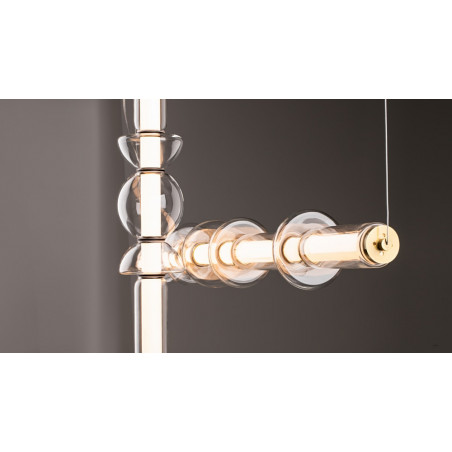 Lampa wisząca szklana podłużna Cosmo LED 98cm przeźroczysto-mosiężna Maytoni